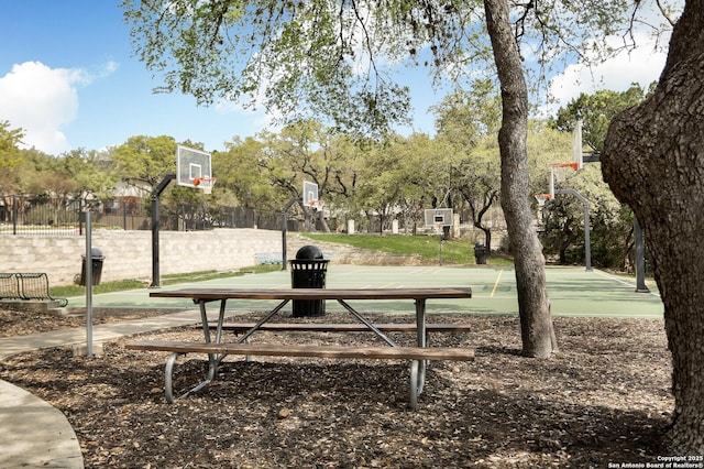 18127 Brookwood Frst, San Antonio, TX 78258 - view of home's community with community basketball court and fence
