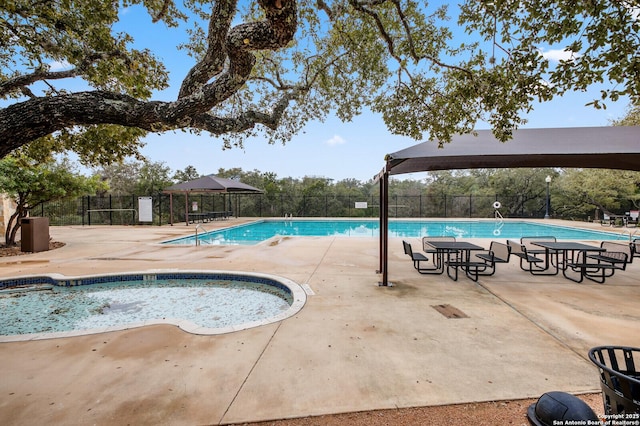 18127 Brookwood Frst, San Antonio, TX 78258 - community pool featuring fence and a patio