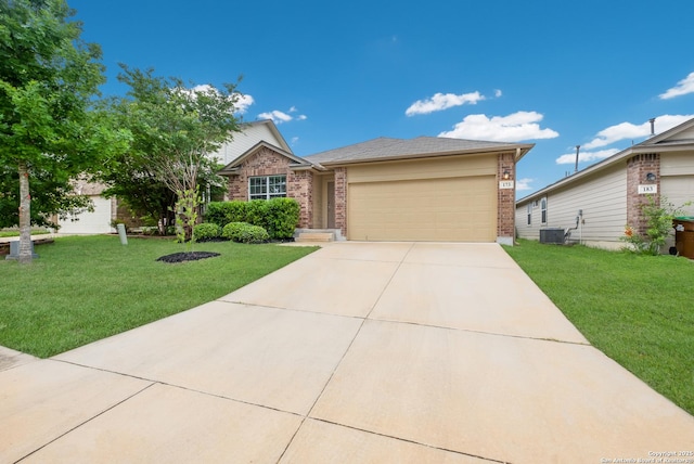 173 Kildeer Crk, San Antonio, TX 78253 - view of front of home with brick siding, an attached garage, driveway, and a front yard