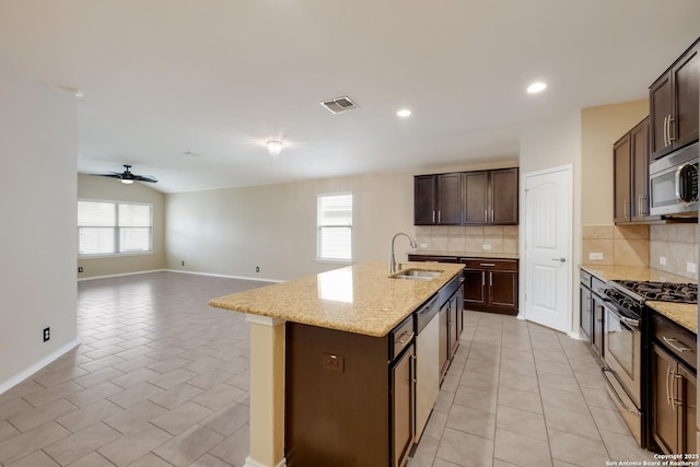 173 Kildeer Crk, San Antonio, TX 78253 - kitchen featuring stainless steel appliances, a sink, backsplash, light tile patterned floors, and recessed lighting