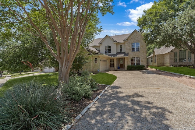 1326 Walkers Way, San Antonio, TX 78216 - traditional home with driveway, stucco siding, and a garage