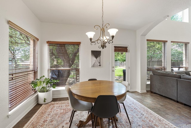 1326 Walkers Way, San Antonio, TX 78216 - dining area with plenty of natural light, a chandelier, and arched walkways