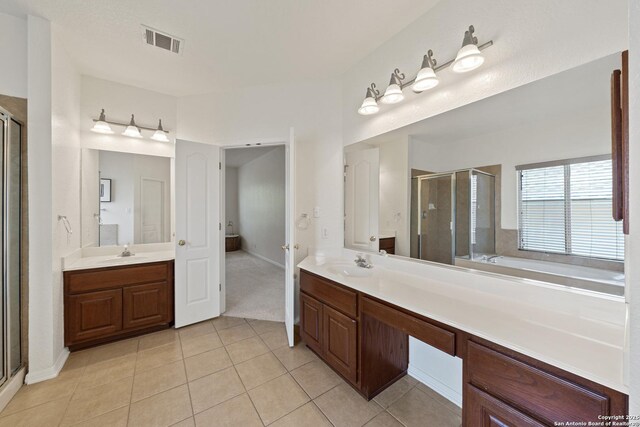 1326 Walkers Way, San Antonio, TX 78216 - full bathroom with tile patterned flooring, a shower stall, and two vanities