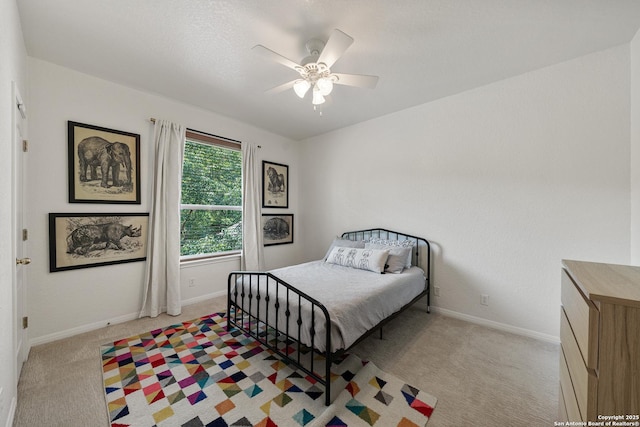 1326 Walkers Way, San Antonio, TX 78216 - bedroom featuring light colored carpet, baseboards, and ceiling fan