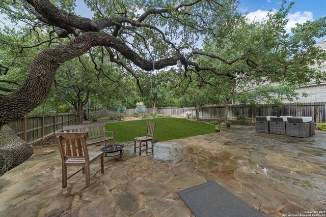 1326 Walkers Way, San Antonio, TX 78216 - view of patio with an outdoor living space with a fire pit