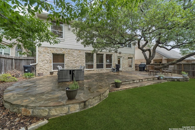 1326 Walkers Way, San Antonio, TX 78216 - rear view of property with stone siding and a patio