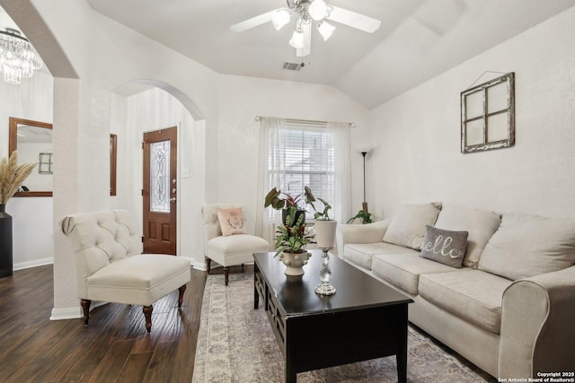 7938 Sterling Mnr, Converse, TX 78109 - living room featuring lofted ceiling, a ceiling fan, wood finished floors, arched walkways, and baseboards