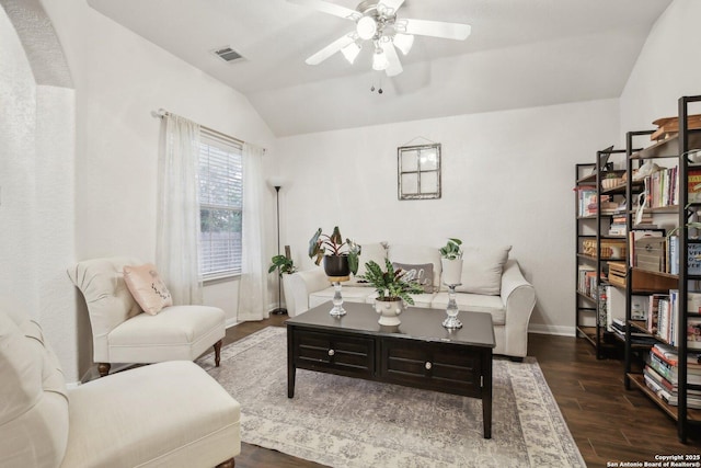 7938 Sterling Mnr, Converse, TX 78109 - living area with vaulted ceiling, a ceiling fan, dark wood-type flooring, and baseboards