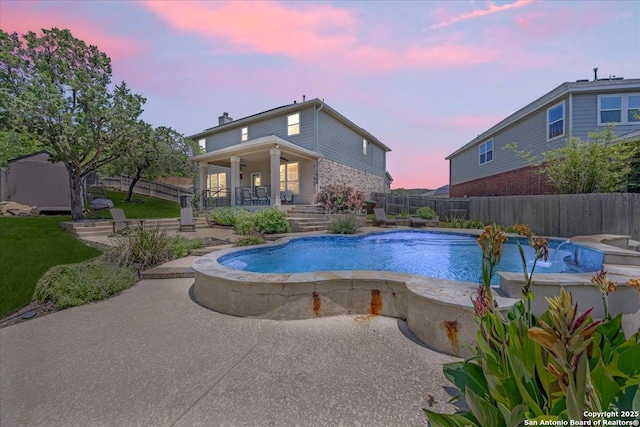 11334 Hill Top Bnd, Helotes, TX 78023 - view of swimming pool featuring fence, a patio, and a storage shed