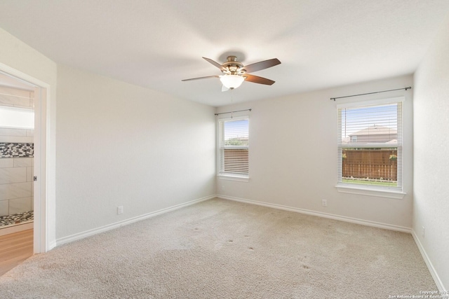 9525 Moon Shine, San Antonio, TX 78254 - unfurnished room with a ceiling fan, light colored carpet, and baseboards