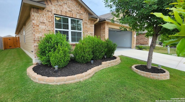 9525 Moon Shine, San Antonio, TX 78254 - view of front of house featuring brick siding, driveway, and an attached garage