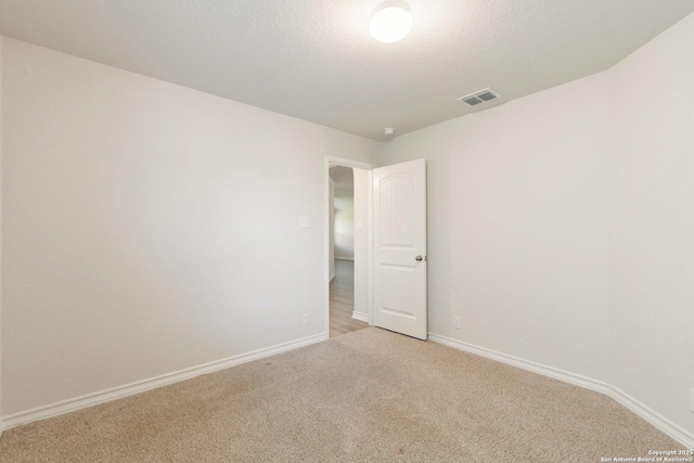 9525 Moon Shine, San Antonio, TX 78254 - spare room with light colored carpet and baseboards