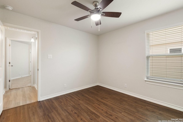 9525 Moon Shine, San Antonio, TX 78254 - empty room with wood finished floors, a smoke detector, baseboards, and ceiling fan