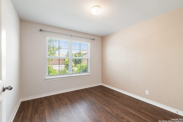 9525 Moon Shine, San Antonio, TX 78254 - unfurnished room featuring dark wood-style floors and baseboards