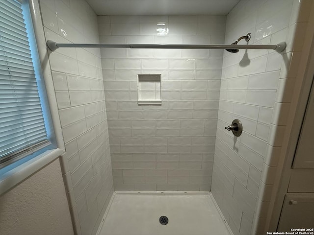 full bath featuring a shower stall