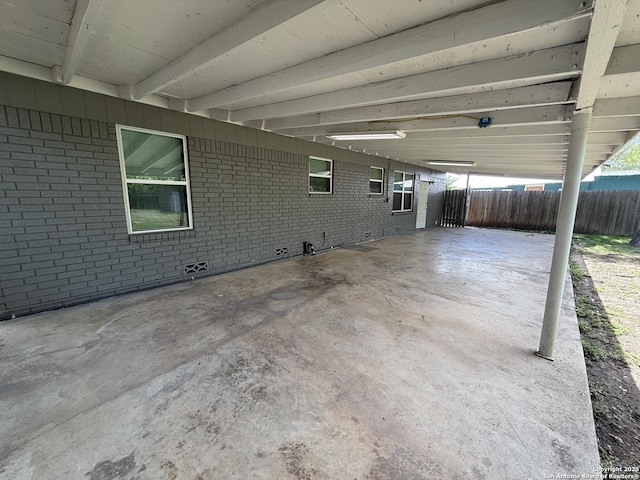 view of patio with fence