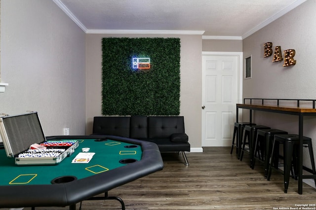 222 Winn, Universal City, TX 78148 - playroom with crown molding, wood finished floors, and a textured ceiling