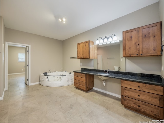 182 Inwood, Poteet, TX 78065 - full bathroom featuring baseboards, a tub with jets, and vanity