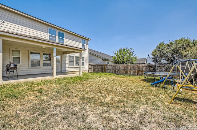 9727 Gypsy Cv, Converse, TX 78109 - view of yard featuring a trampoline