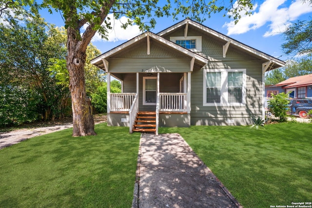 235 Wainwright, San Antonio, TX 78211 - bungalow featuring a porch and a front lawn
