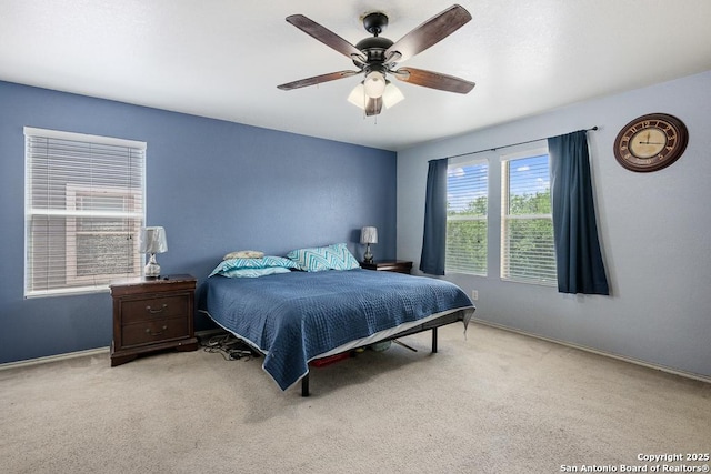 9127 Sycamore, San Antonio, TX 78245 - carpeted bedroom with baseboards and a ceiling fan