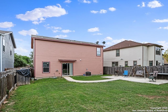 9127 Sycamore, San Antonio, TX 78245 - back of house with a patio area and central AC unit