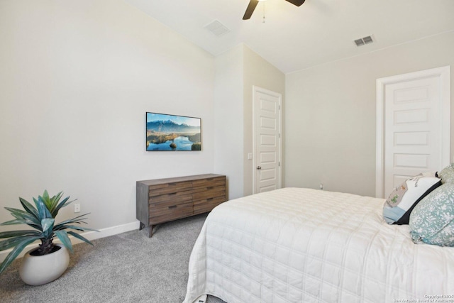 bedroom with light colored carpet, ceiling fan, baseboards, and lofted ceiling
