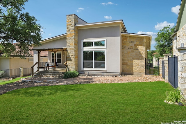 rear view of house featuring stone siding and stucco siding