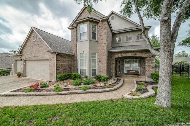 438 Chimney Tops, San Antonio, TX 78260 - view of front of property with stucco siding, a garage, driveway, and brick siding