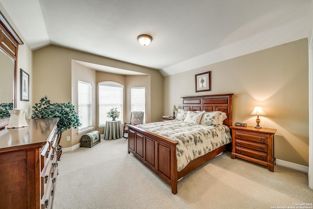 438 Chimney Tops, San Antonio, TX 78260 - bedroom featuring lofted ceiling, light carpet, and baseboards