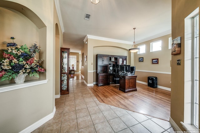 438 Chimney Tops, San Antonio, TX 78260 - foyer entrance featuring ornamental molding, light tile patterned flooring, baseboards, and arched walkways