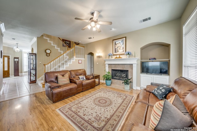 438 Chimney Tops, San Antonio, TX 78260 - living area featuring stairs, wood finished floors, and healthy amount of natural light