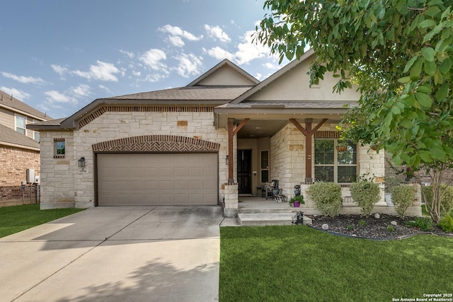 13926 Cohan Way, San Antonio, TX 78253 - view of front of home with stone siding, an attached garage, a front lawn, and concrete driveway