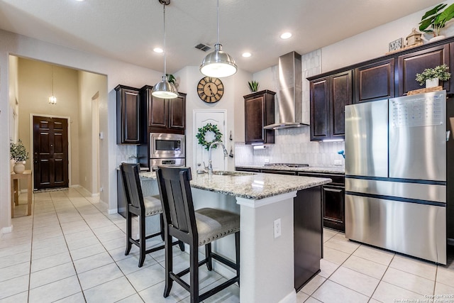 13926 Cohan Way, San Antonio, TX 78253 - kitchen with stainless steel appliances, a sink, wall chimney exhaust hood, light tile patterned flooring, and tasteful backsplash