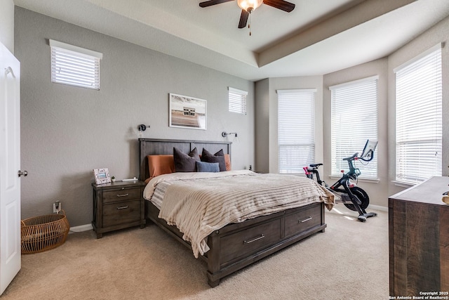 13926 Cohan Way, San Antonio, TX 78253 - bedroom featuring light carpet, baseboards, a ceiling fan, and a tray ceiling
