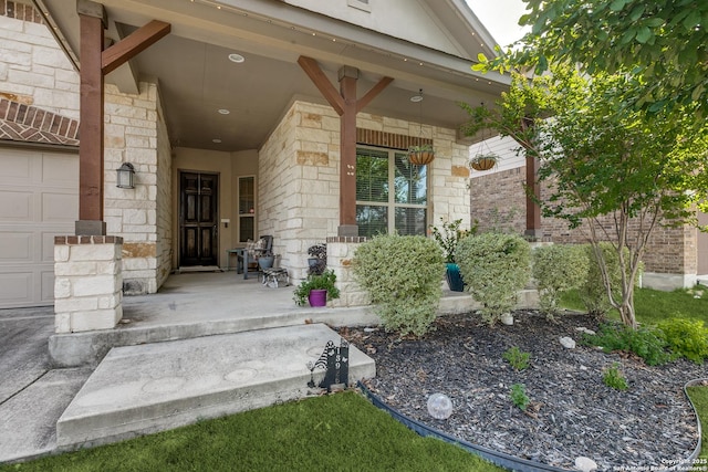 13926 Cohan Way, San Antonio, TX 78253 - view of exterior entry featuring covered porch, stone siding, a garage, and brick siding