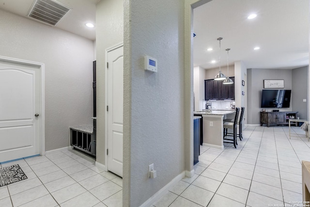 13926 Cohan Way, San Antonio, TX 78253 - hallway with light tile patterned flooring, recessed lighting, a textured wall, and baseboards