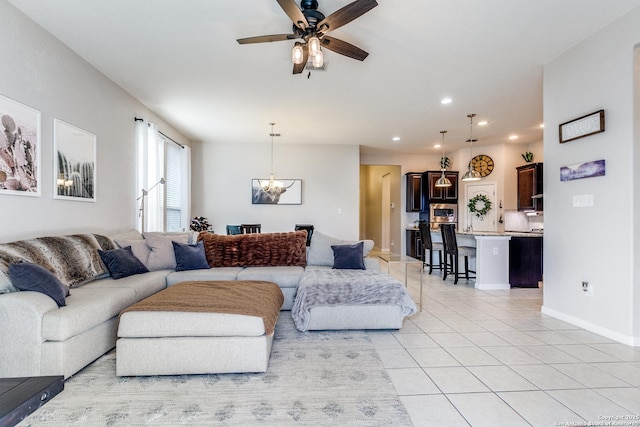 13926 Cohan Way, San Antonio, TX 78253 - living room featuring light tile patterned floors, a chandelier, a ceiling fan, recessed lighting, and baseboards