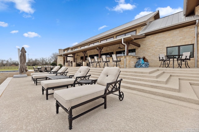 view of property's community with a patio area