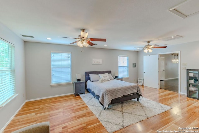 15522 Wood Sorrel, San Antonio, TX 78247 - bedroom with light wood-type flooring, a ceiling fan, baseboards, and recessed lighting