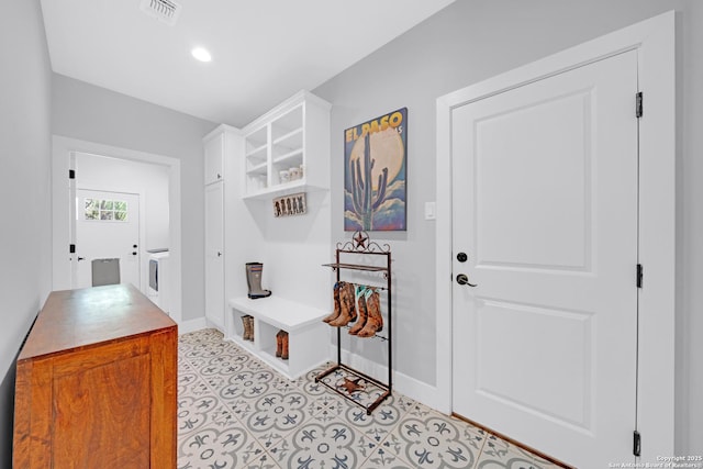 mudroom with baseboards and recessed lighting