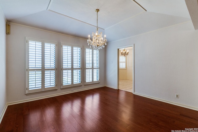 9007 Luzita Ln, San Antonio, TX 78230 - unfurnished dining area with a chandelier, wood finished floors, baseboards, and crown molding