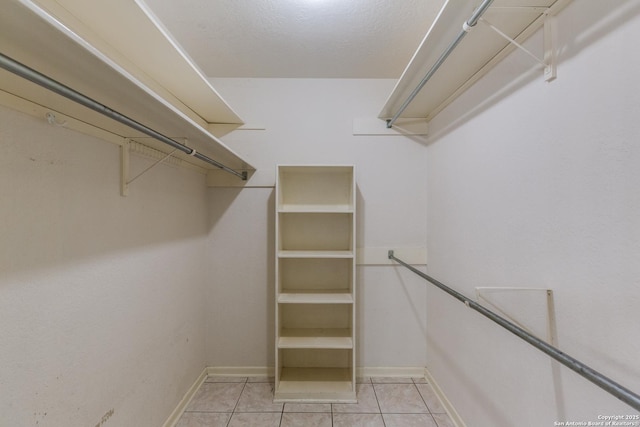9007 Luzita Ln, San Antonio, TX 78230 - spacious closet with light tile patterned floors