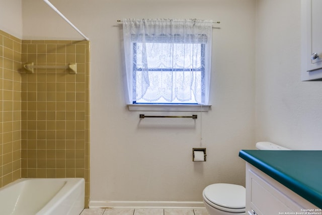 9007 Luzita Ln, San Antonio, TX 78230 - bathroom featuring toilet, baseboards, vanity, tile patterned floors, and bathing tub / shower combination