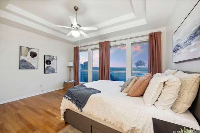 120 Seth Raynor, New Braunfels, TX 78130 - bedroom with a raised ceiling, wood finished floors, ornamental molding, baseboards, and ceiling fan