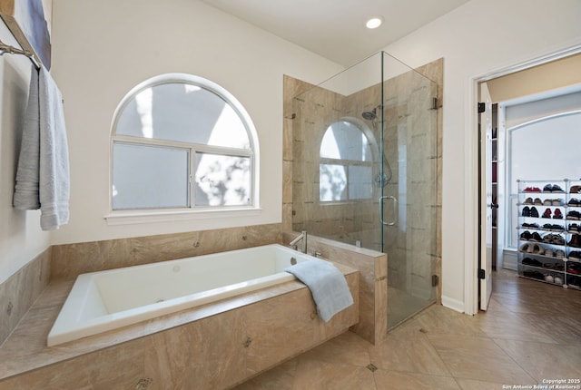 120 Seth Raynor, New Braunfels, TX 78130 - full bath with a stall shower, a bath, a walk in closet, and recessed lighting