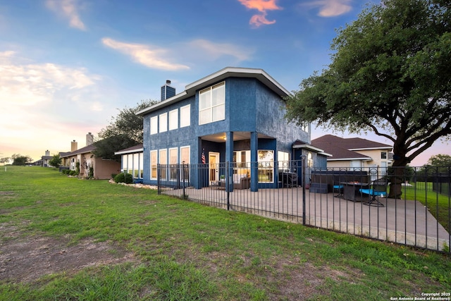 120 Seth Raynor, New Braunfels, TX 78130 - rear view of house with a patio, a chimney, and stucco siding