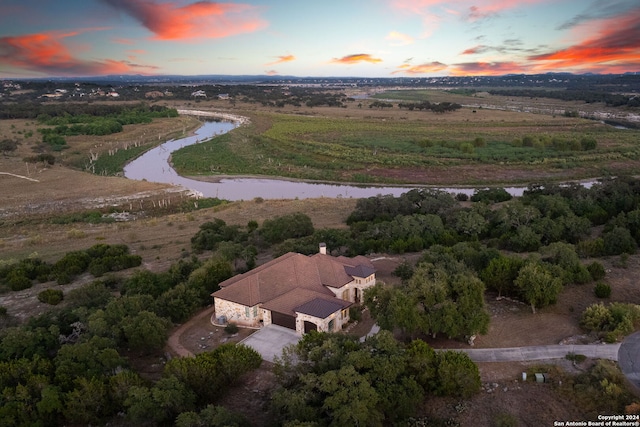 1148 Mission Way, Canyon, TX 78133 - aerial view at dusk of a water view