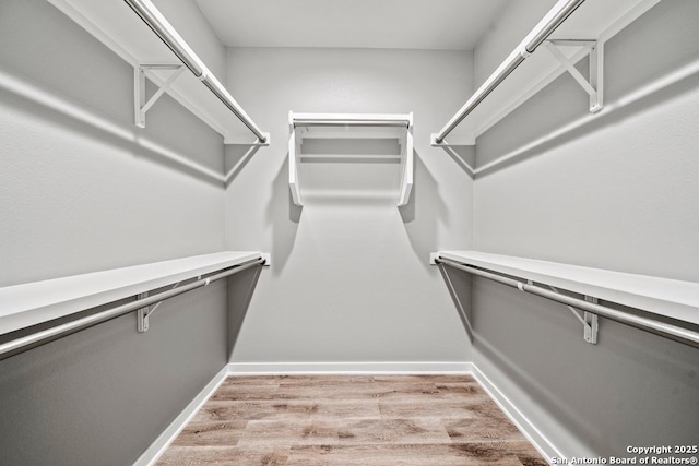 1053 Ledge Path, Canyon Lake, TX 78133 - walk in closet with wood finished floors