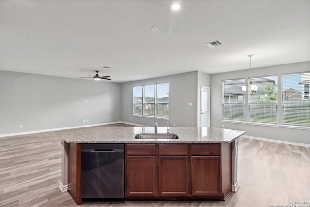 15006 Tethys Way, San Antonio, TX 78245 - kitchen featuring dishwasher, a sink, open floor plan, ceiling fan, and a kitchen island with sink